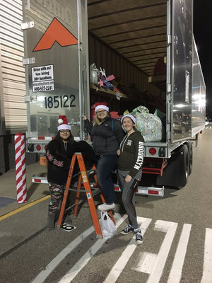 Independence students with semi truck for Ashley's Angels program